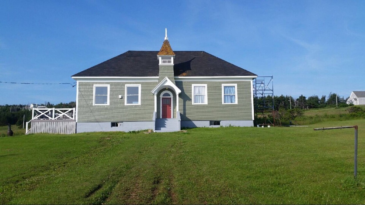 Port Hood Cottage | Island Retreat in Elegantly Restored Schoolhoue with Panoramic Ocean Views