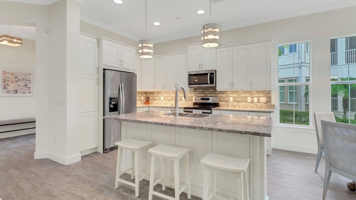 Isles of Collier Preserve Apartment | Isles of Collier | 3 bedrooms | 3 bathrooms | a den/office | sunroom | 2-car garage.