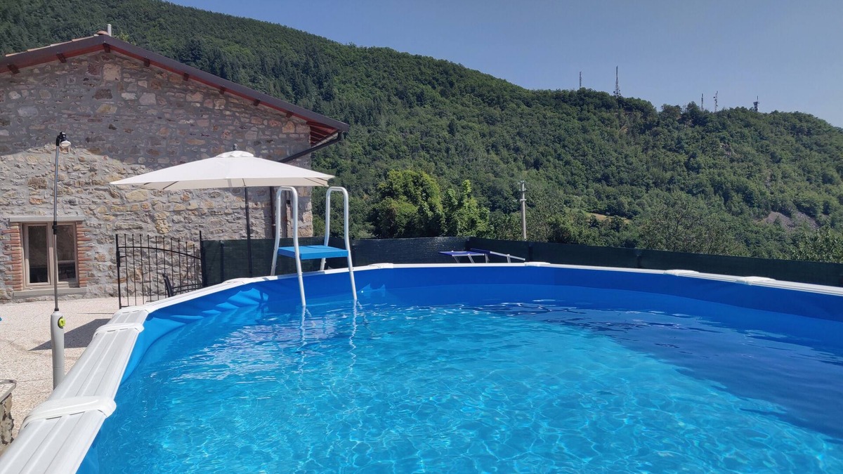 Villa Collemandina House | Cottage in medieval village, private pool, walk to restaurants