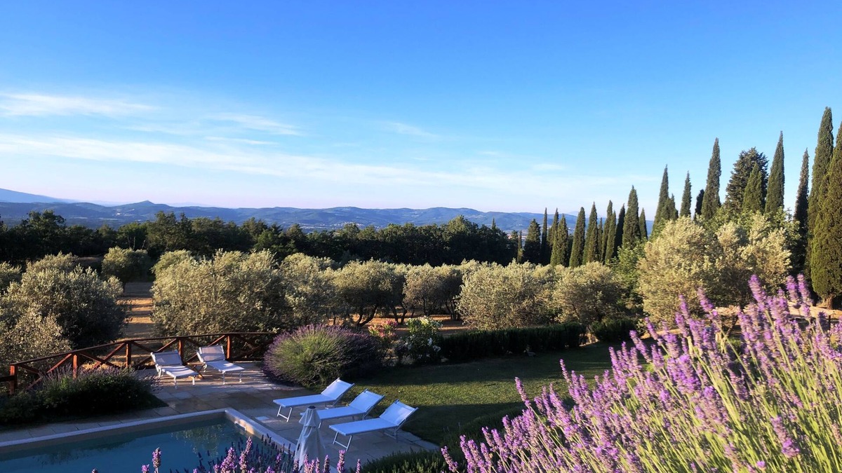 Loro Ciuffenna Villa | Poggio Corsucci.Historic stone house with swimming pool and enchanting view.
