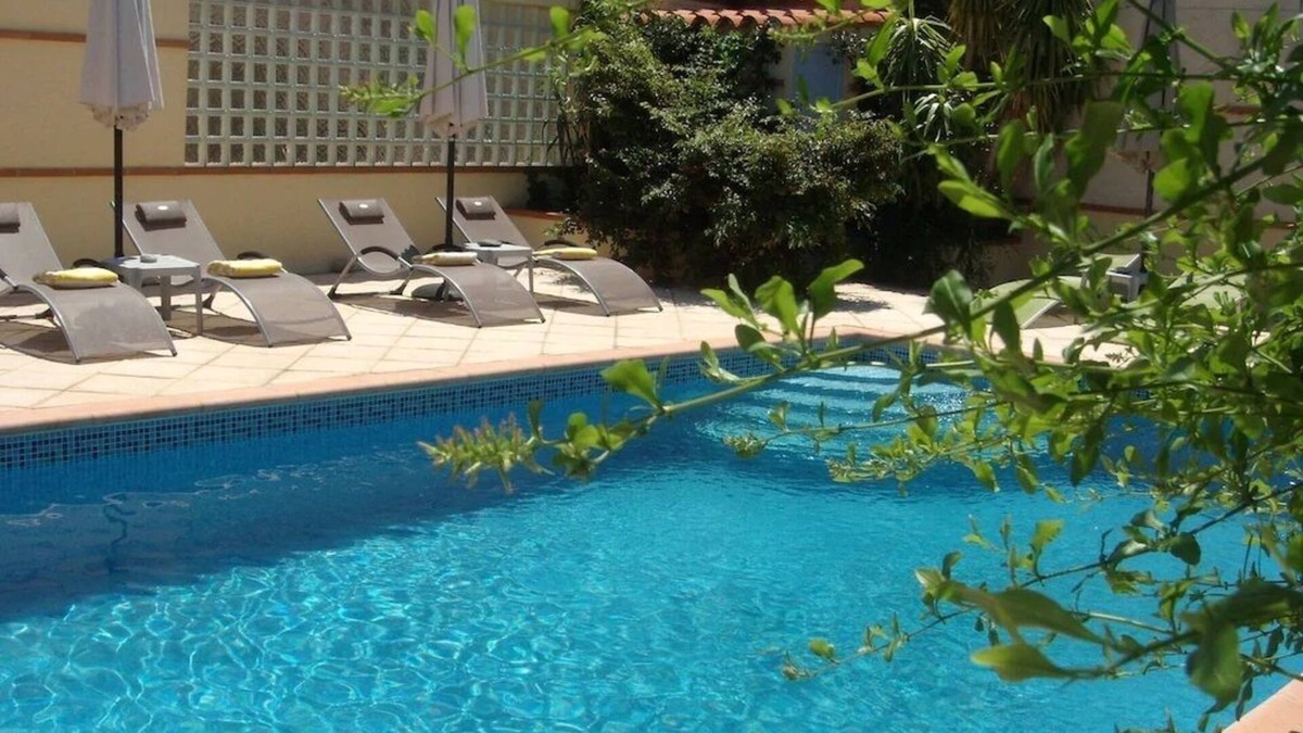 Espira de l'Agly Apartment | Ivy covered stone Mas part of an 18th century former convent.