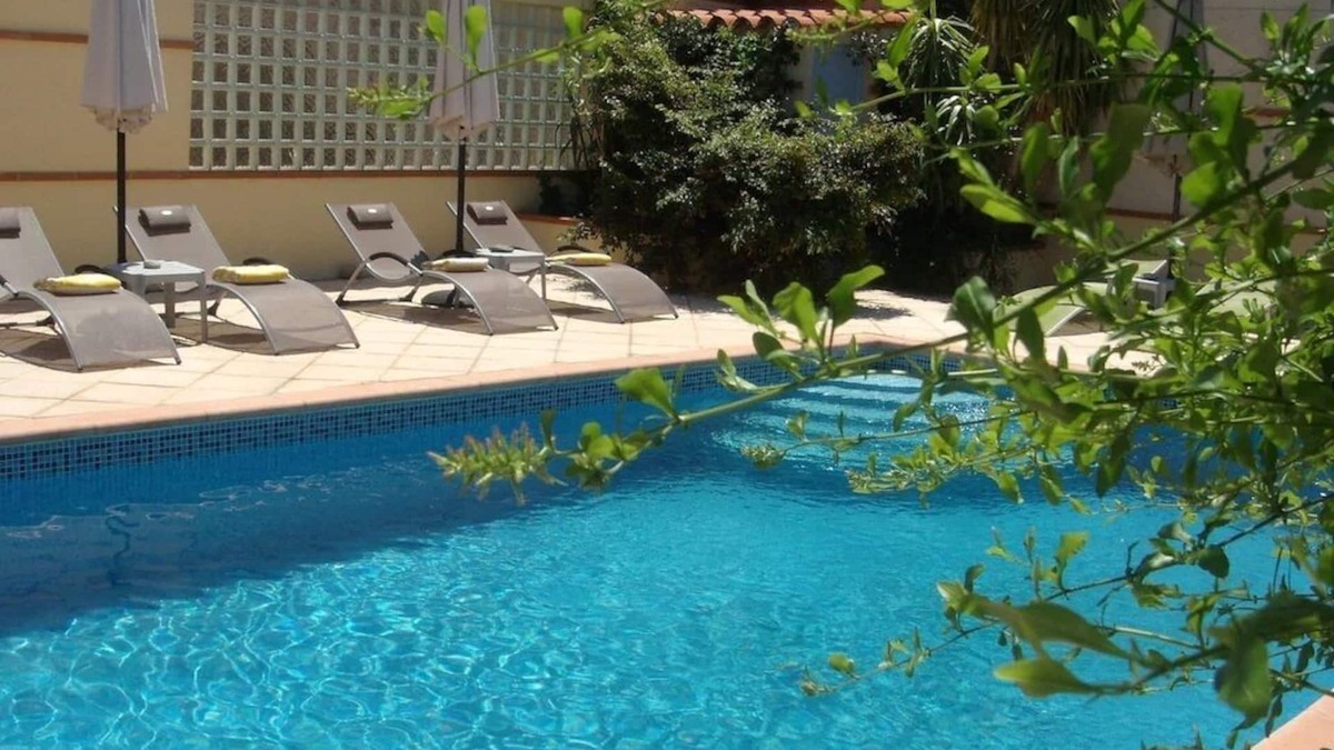 Espira de l'Agly Apartment | Ivy covered stone Mas part of an 18th century former convent.