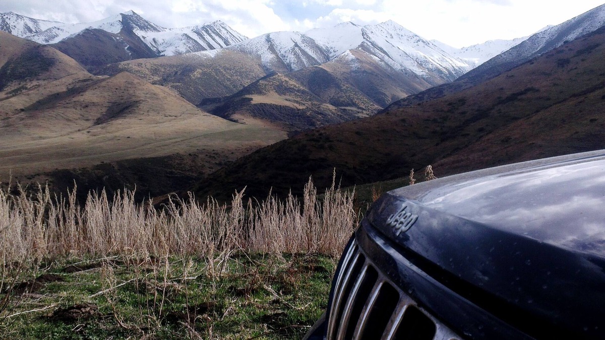 Bishkek House | Jeep with camping equipment