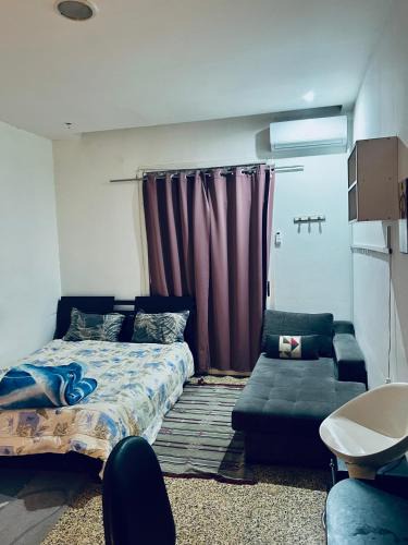 Mnihla House | Jolie chambre