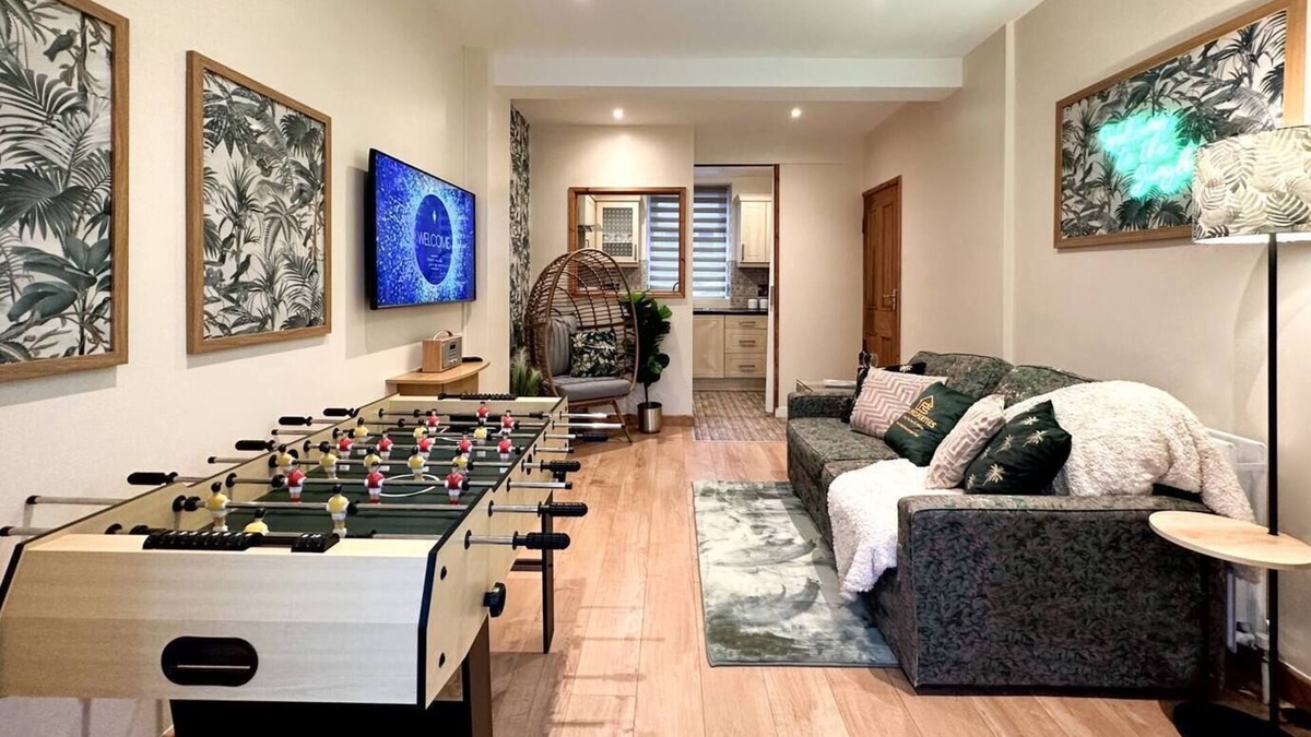 Rhondda Cynon Taff Apartment | Joyful Jungle Jewel w/Balcony & Foozeball-Ferndale