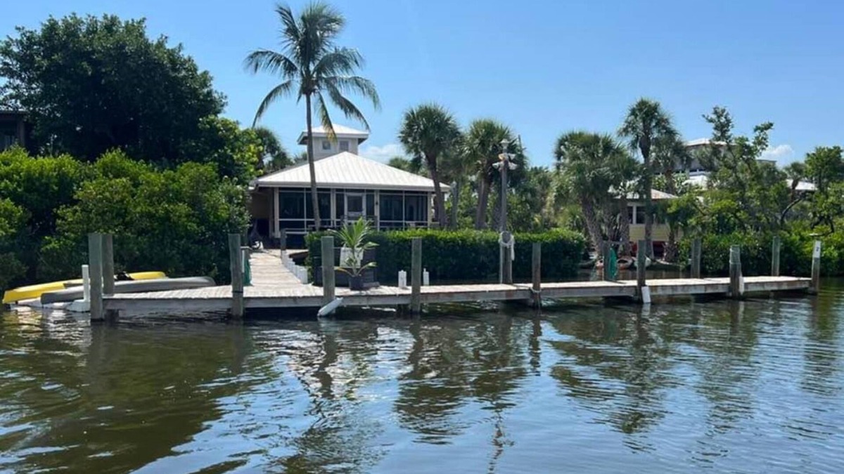 Placida House | Keep your boat in view from the house! Private dock; boardwalk leads to beach