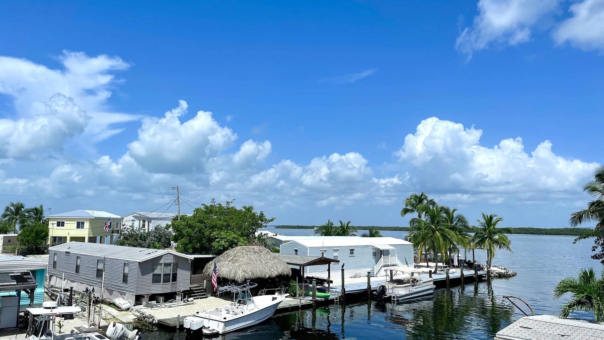 Sexton Cove Estates House | Key Largo Waterfront Paradise! 90 ft. dock, Bikes, Kayaks, and More!