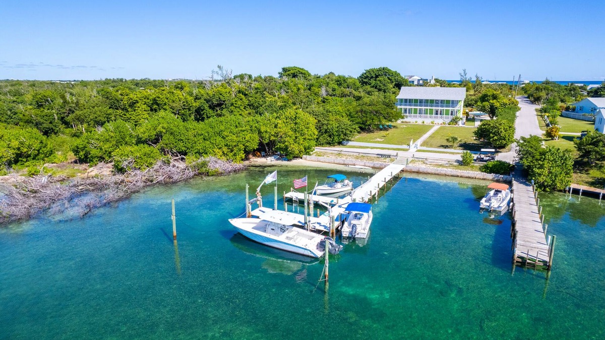 Treasure Cay House | Key Lime House with a 100’ dock: A Solar-Powered Waterfront Oasis on Black Sound