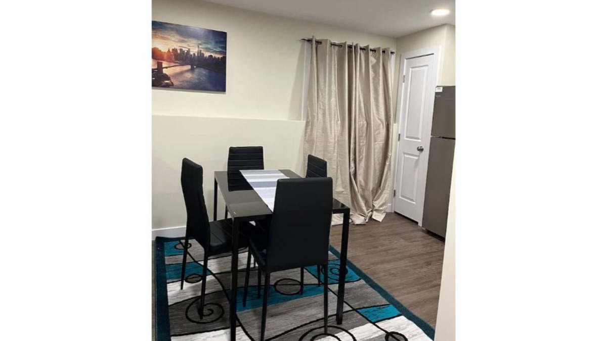 Saskatoon Apartment | Kick back & relax in this calm, stylish space.