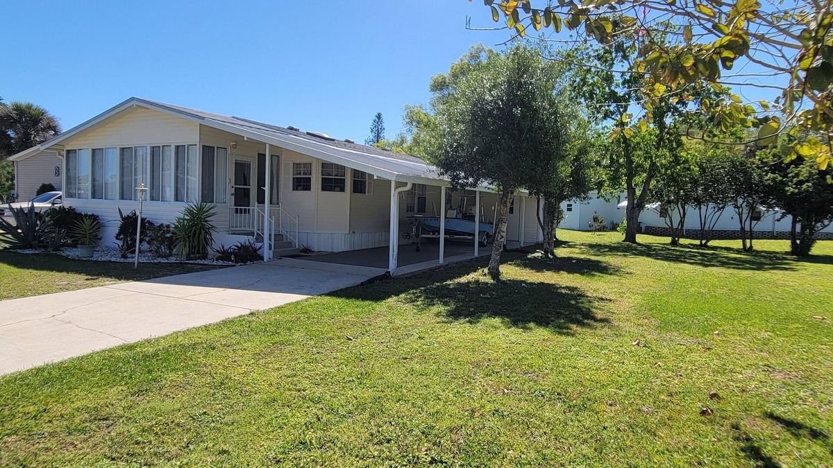 Edgewater House | Kick Back & Relax with two pools, a boat launch, community pier and more!
