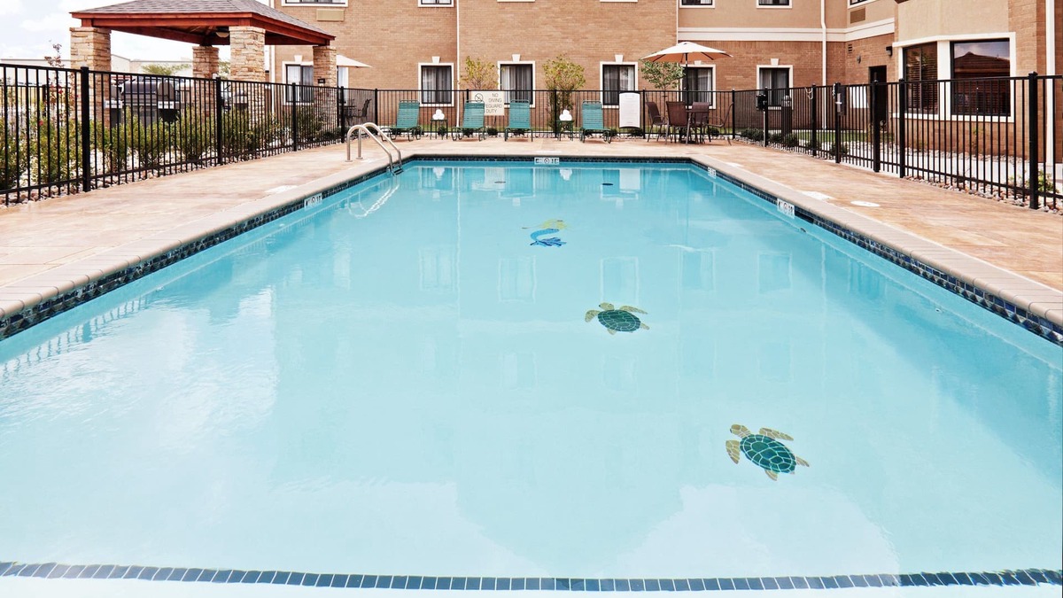 Oklahoma City Condo | King Suite. Free Breakfast Buffet Daily. Outdoor Pool.
