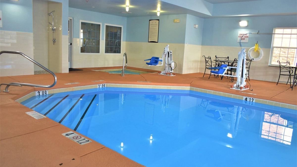 Northeast Heights Condo | King Suite | Free Breakfast Buffet! Pool + Hot Tub Access