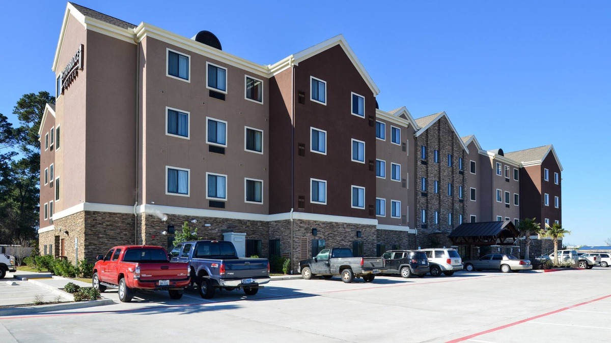 Tomball Condo | King Suite in Tomball | Shared Outdoor Pool + 24h Fitness Center