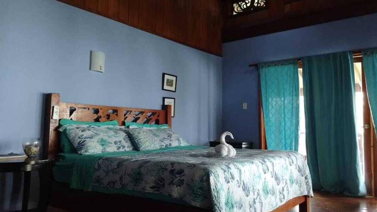 Carenero Island Bed & Breakfast | King Suite Ocean and Jungle View wrap around private balcony