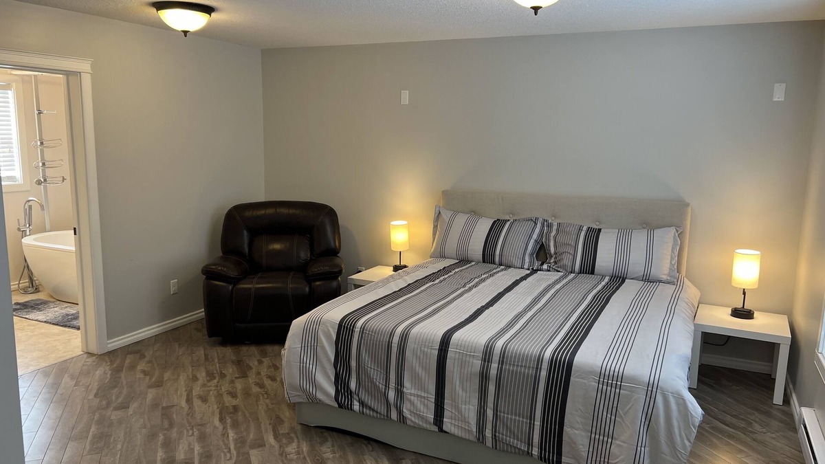 Three Hills House | King Suite with FireplacenUpper Floor Suite