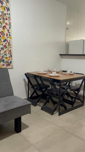 Jardim Virginia Apartment | Kit net completa na Praia da Enseada