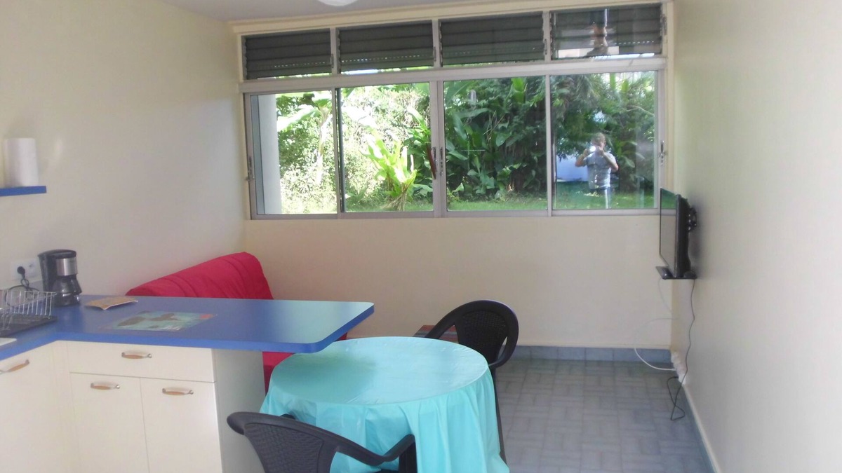 Saint-Claude House | Kitchen-living room and air-conditioned bedroom, at the foot of La Soufrière.