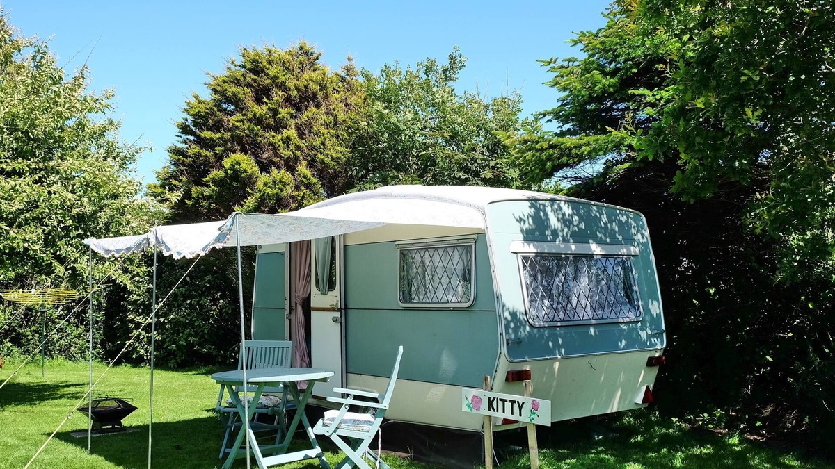 Grade Cabin | KItty unique 60s caravan set in pretty garden