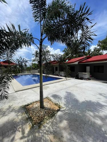 Guindulman Hotel | KJT Travellers Inn