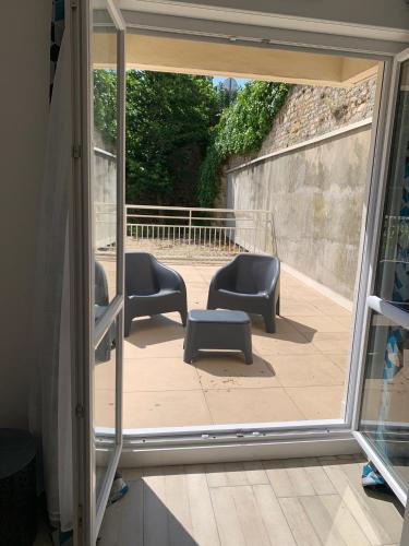 Le Marais Apartment | La Grande Terrasse, appartement rez-de-jardin