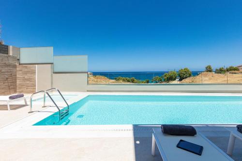 Panormos Villa | Lagoon Seaside Villa, Sumptuous Retreat,By ThinkVilla