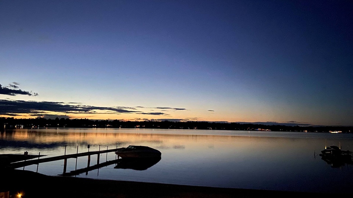 National City Cottage | Lake/beach front property with kayaks, pedal boat, & row boat, near Tawas Bay