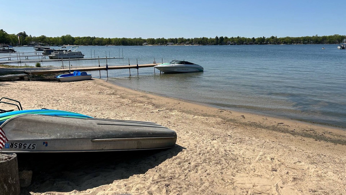 National City Cottage | Lake/beach front property with kayaks, pedal boat, & row boat, near Tawas Bay