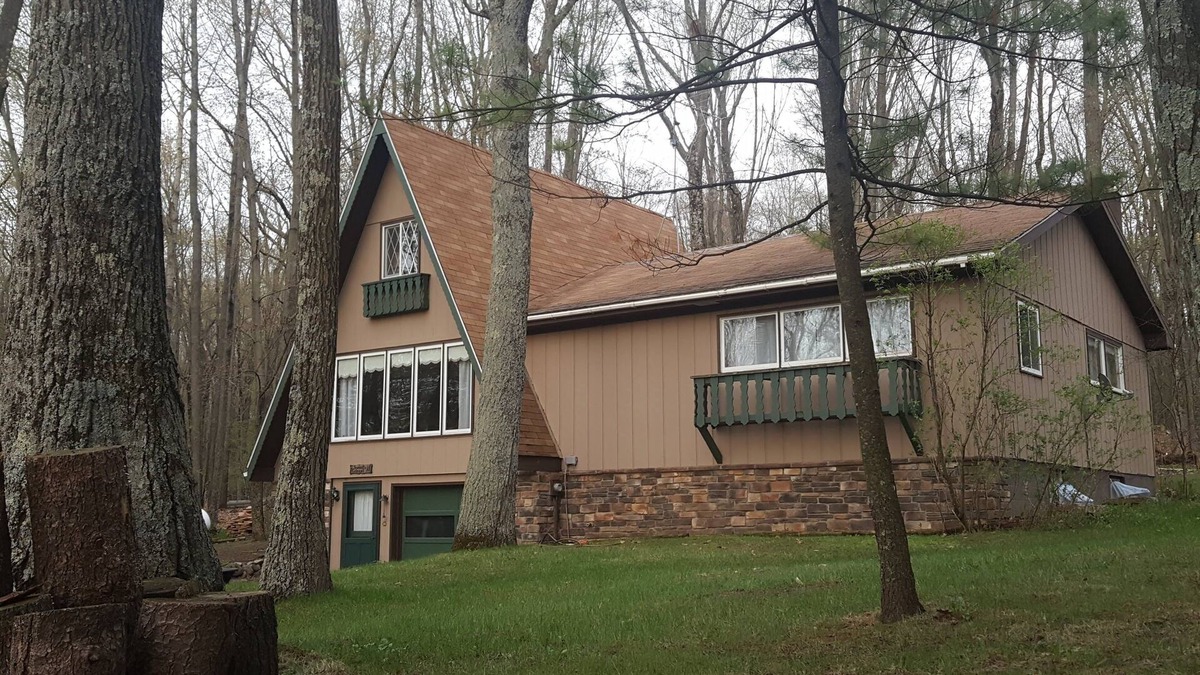 Iola Cottage | Lake + forest view 1650 sf cottage in rolling hills of Central Wis. LAKE ACCESS.