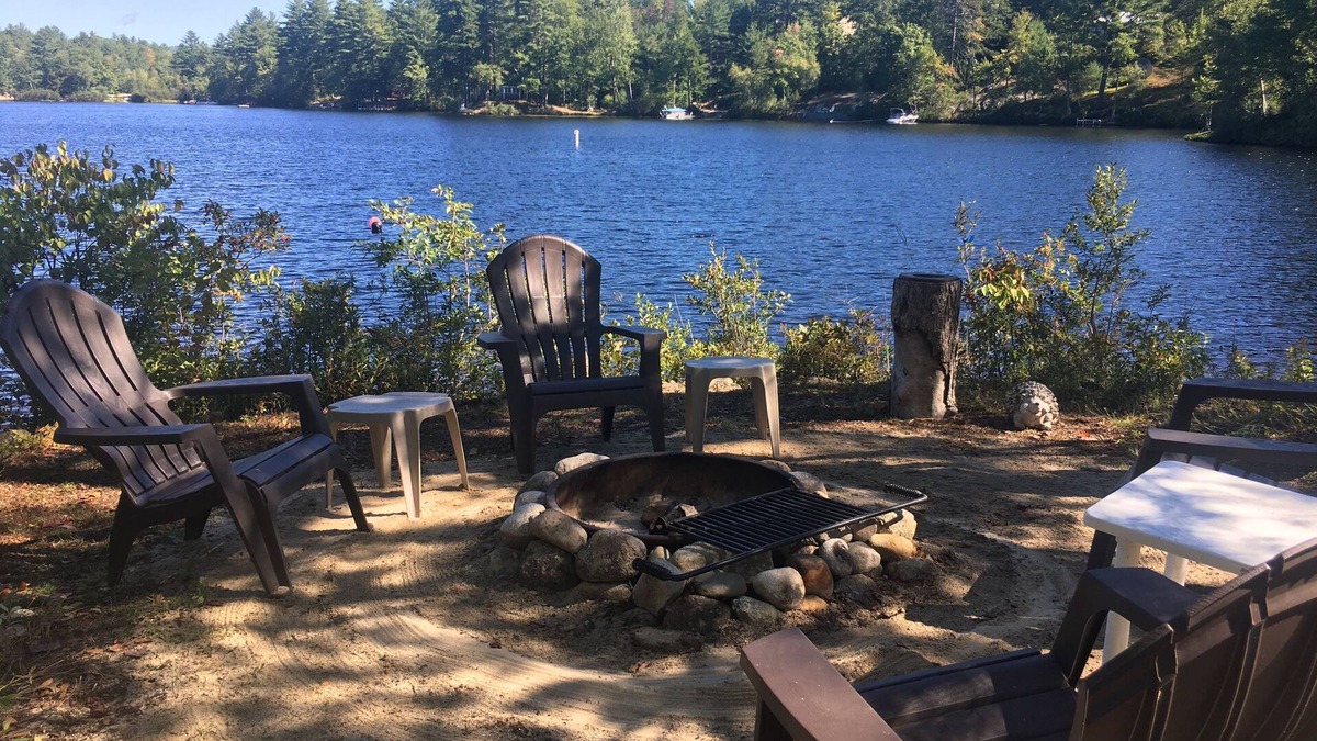 Freedom Cabin | Lake Ossipee New Hampshire waterfront cabin with beach, dock, fire pit, privacy.