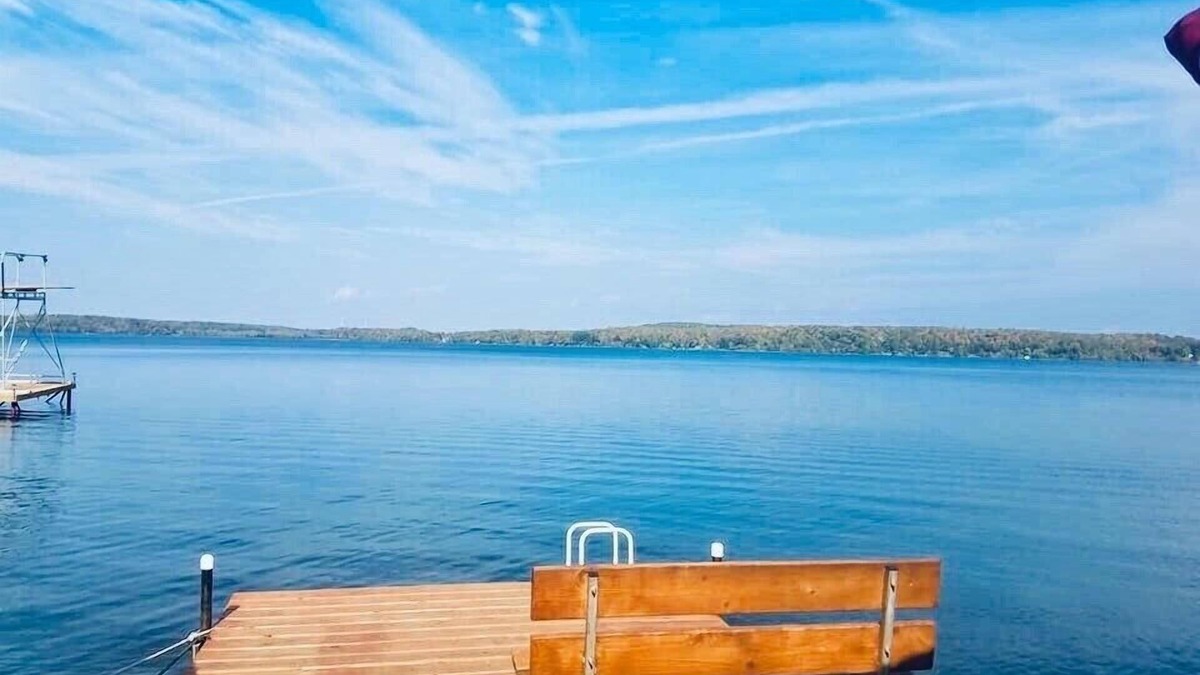Grand Rapids Cabin | Lake Pokegama recreational cabin with private sandy beach and diving platform.