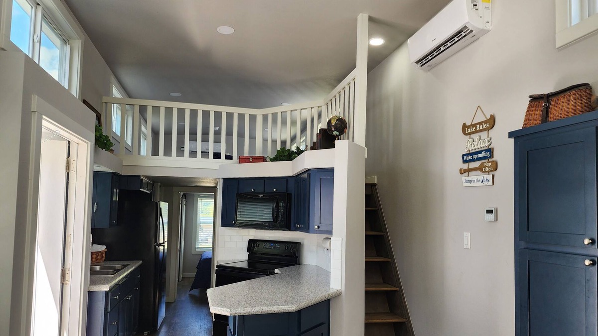 Berryville Cabin | Lake Side Tiny Home, large deck.