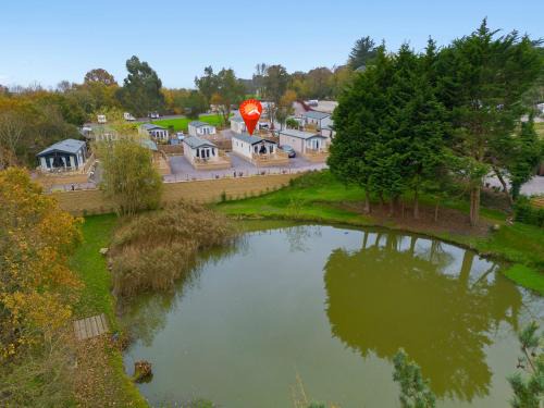 Cheriton Bishop Ski Chalet | Lake View Holiday Home - Fishing Lakes, Heated Outdoor Swimming Pool 500yrds on Sister Park