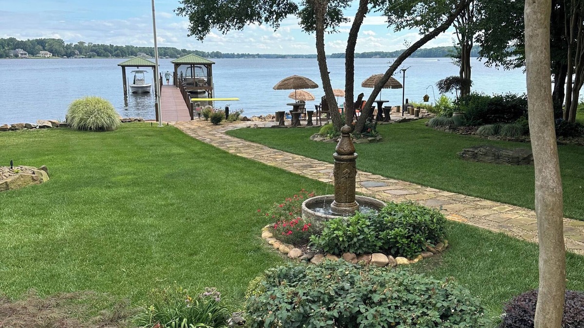 Terrell Cottage | LAKEFRONT GARDEN COTTAGE- beach, screened porch, dock, private, amazing views