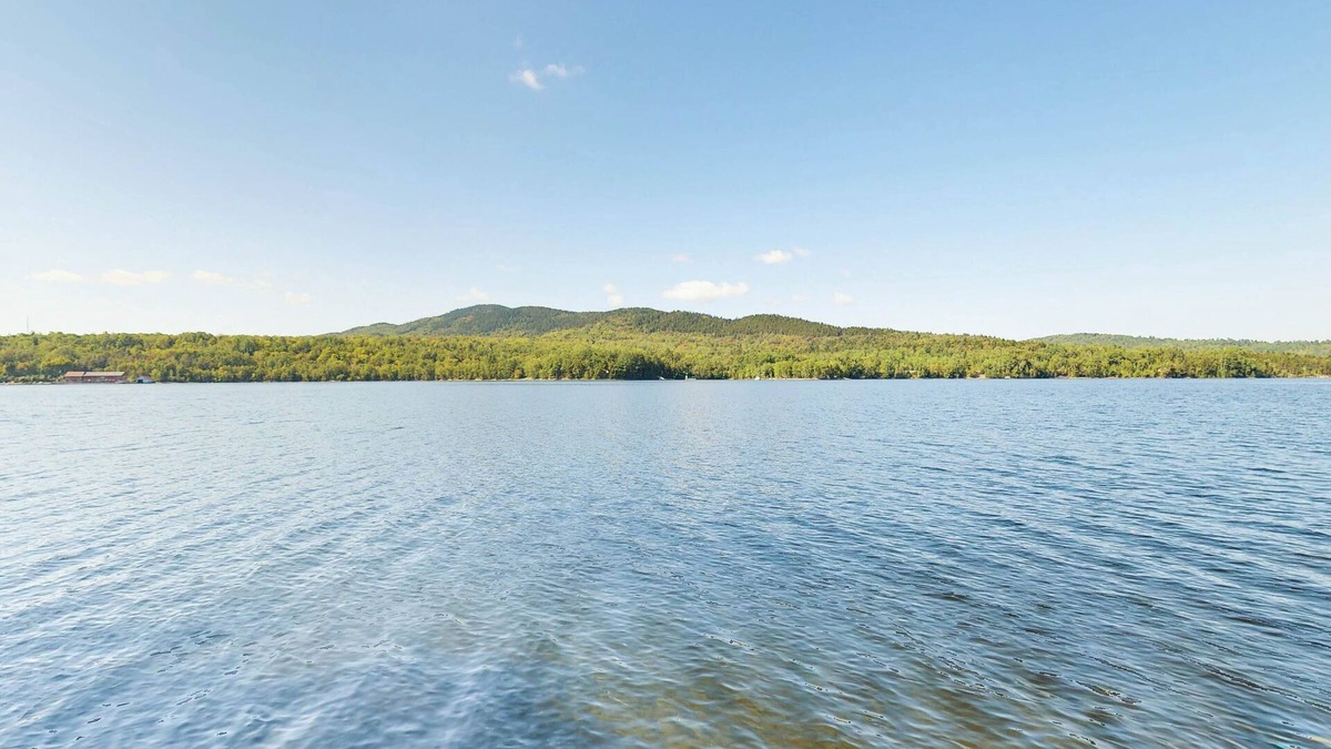 Greenville Junction Cabin | Lakefront cabin with private dock & beach access