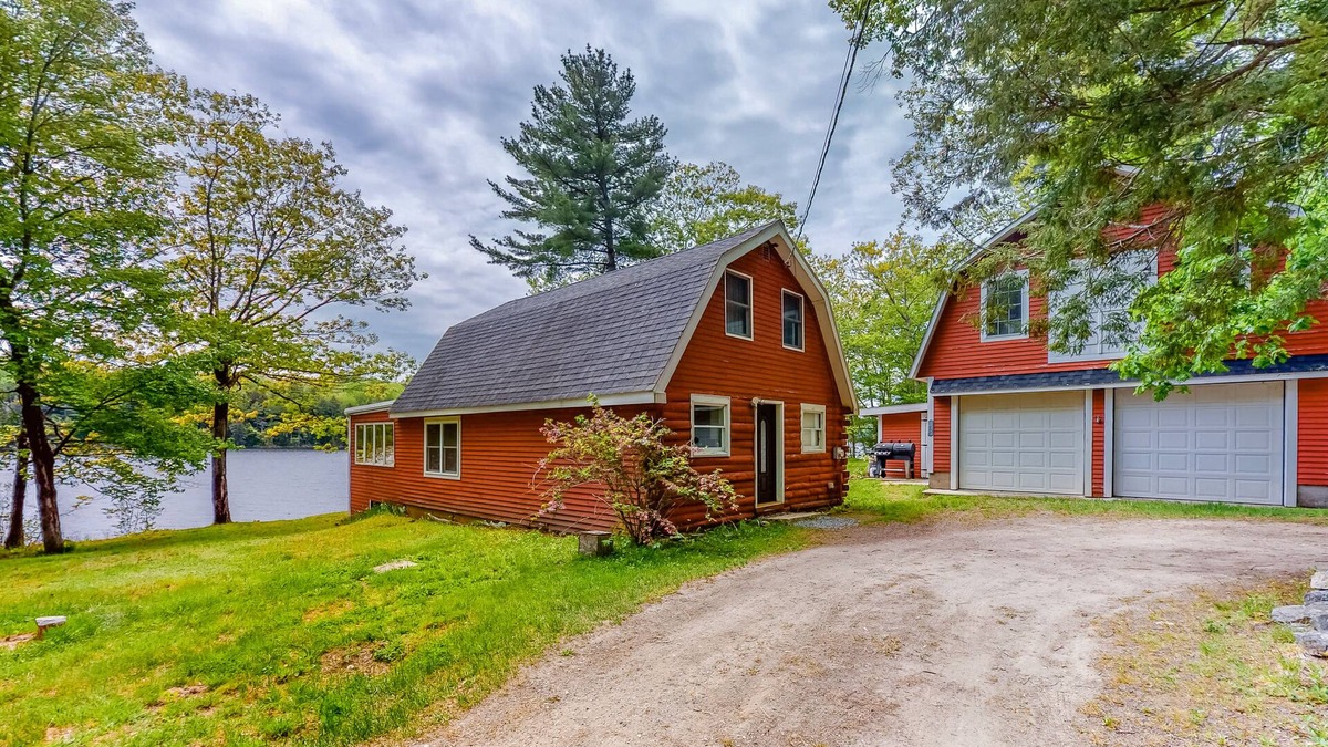 Weeks Mills Cabin | Lakefront cabin with private dock, wood stove, firepit, deck, & grill - 1 dog ok