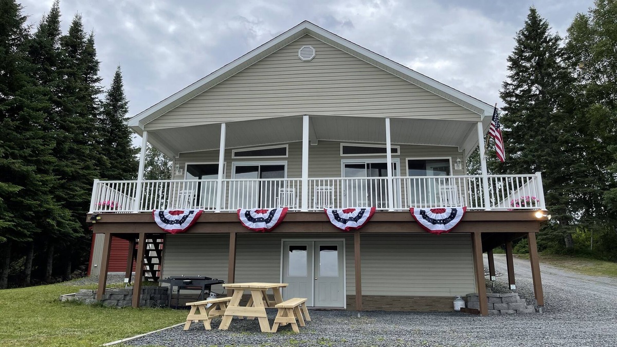 Eagle Lake Cottage | Lakefront cottage with private beach, near trails
