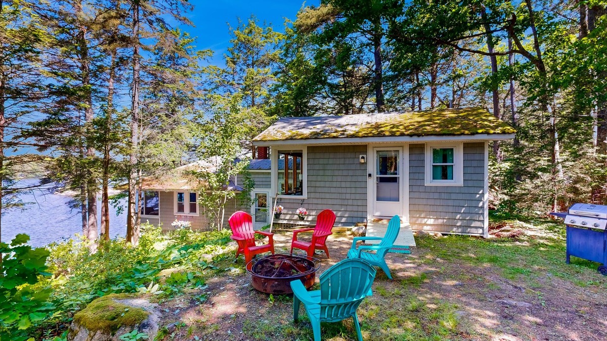 Bremen Cabin | Lakefront cottage with dock, screened porch, & Island in Biscay Pond