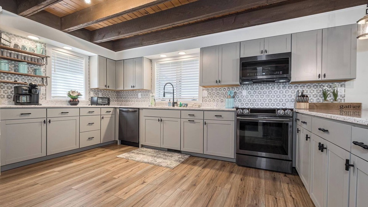Oakland House | Lakefront, dog friendly, dock slip, hot tub, and fire pit