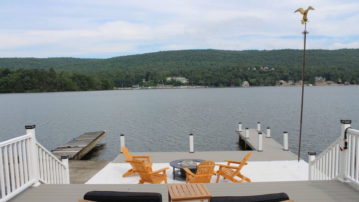 Hewitt House | Lakefront Haven Private Beach Dock Fire Pit Game Room Boat Rental