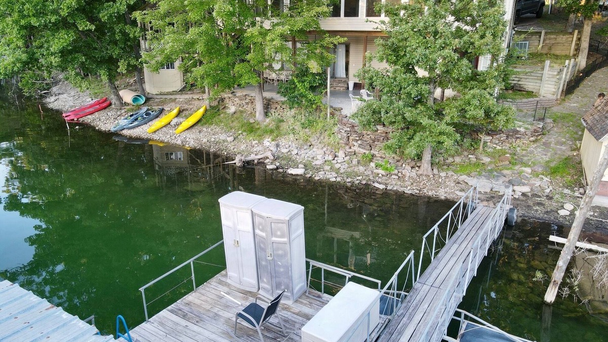 Lost Bridge Village House | Lakefront home right on the water, private cove on Beaver Lake, Garfield, AR