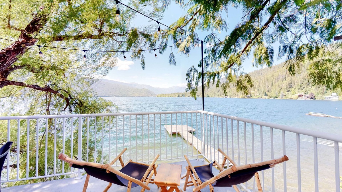 Christina Lake Cabin | Lakefront home with dock, fireplace, washer/dryer, and mountain views - dogs OK