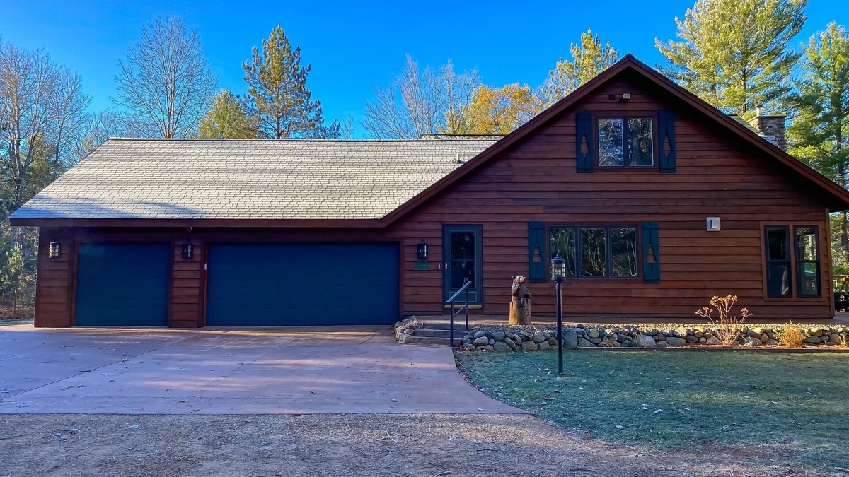 Conover House | Lakefront home with game rooms, dock, kayaks, private beach, fireplace, firepit