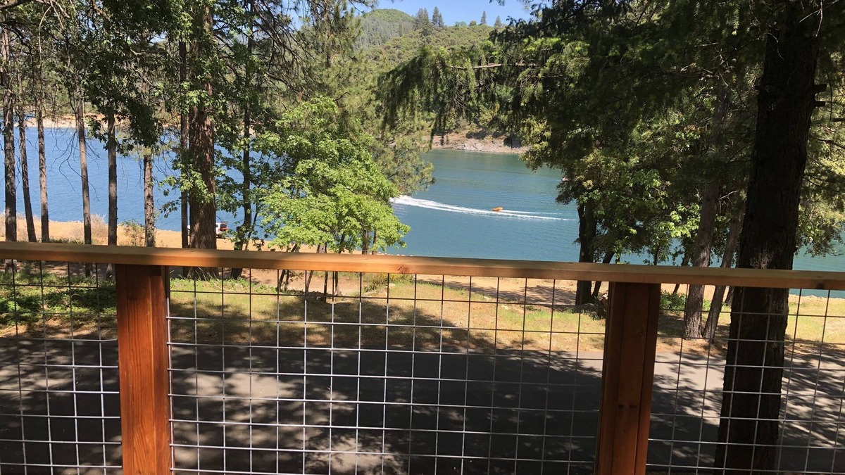 Lakehead House | Lakefront house with 1000 sq/ft of decking with unobstructed view of the water.