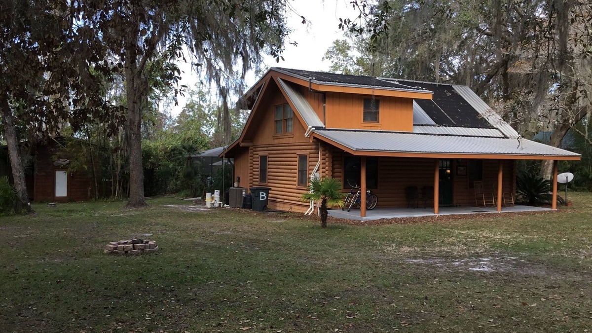 Hawthorne House | Lakefront Log Home, Screened Heated Pool, & Recreation House