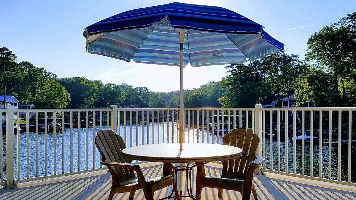 New London House | Lakefront Luxe Retreat in Tranquil Cove Endless Enjoyment Lakeside Fireplace