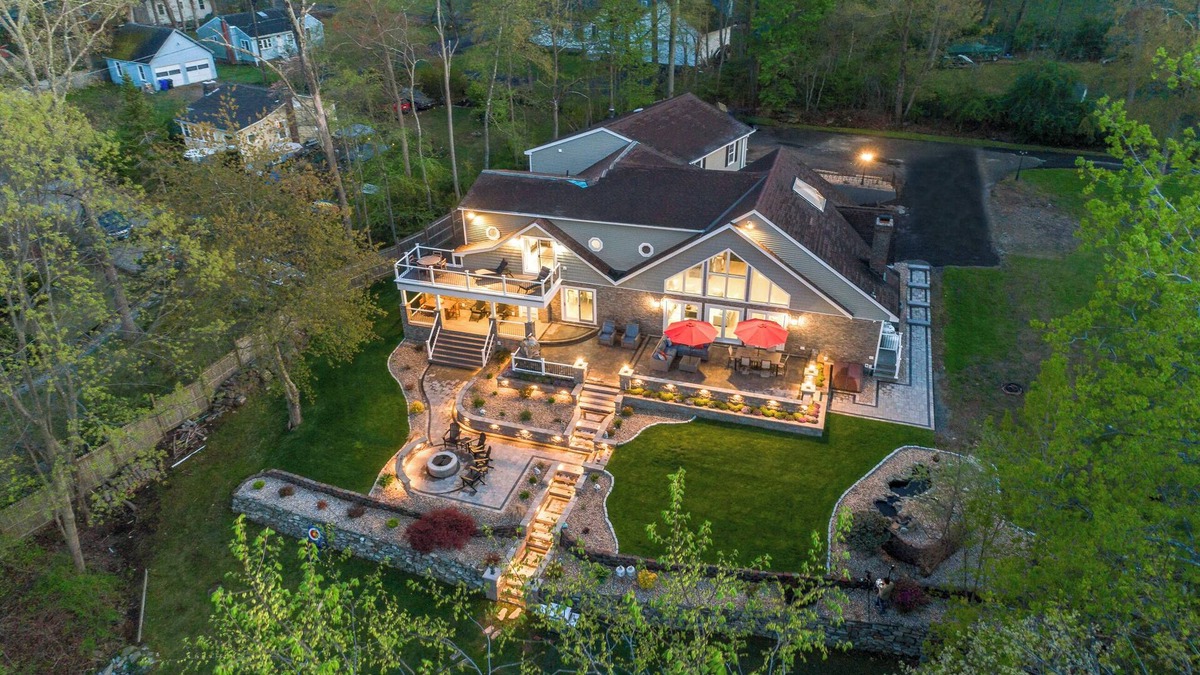 Coventry Lake House | Lakefront Luxury House, with Kayaks, Fire pit, Game Room and Home Theater!
