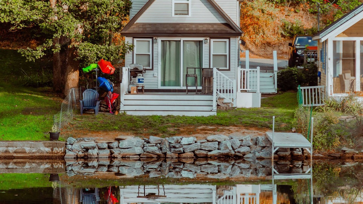 Westminster Cottage | Lakefront; view of ski mountain, firepit, dock, kayaks, paddle board