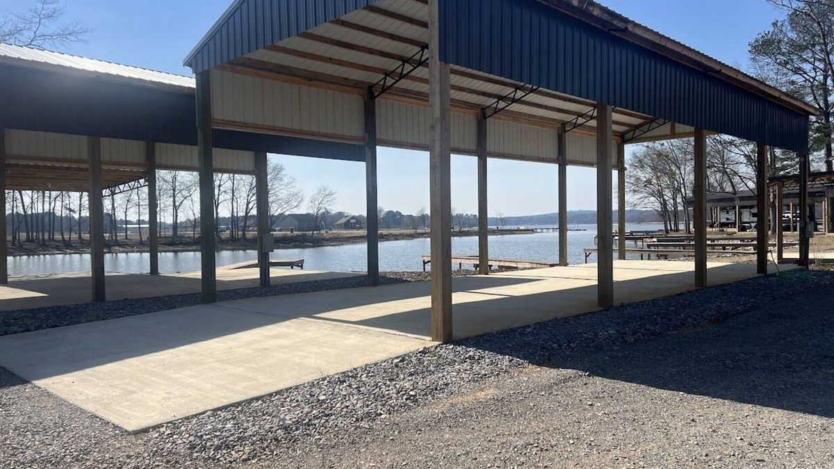 Lincoln RV Rental | Lakeside Comfort: Covered RV Site with Private Pier #1