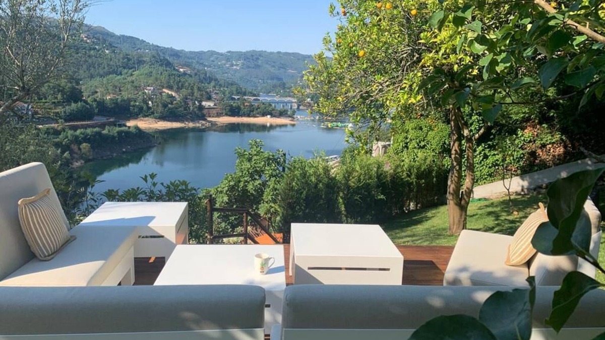 Terras de Bouro Cottage | Lakeside cottage with fireplace, views and terraced gardens