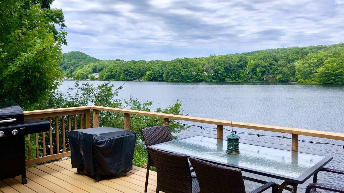 Ledyard Cottage | Lakeside cottage overhanging the water, beautiful window views across the lake